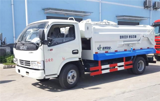 東風(fēng)小多利卡側(cè)裝壓縮式對(duì)接垃圾車(5立方)圖片